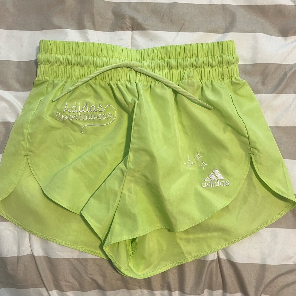 Green Adidas shorts